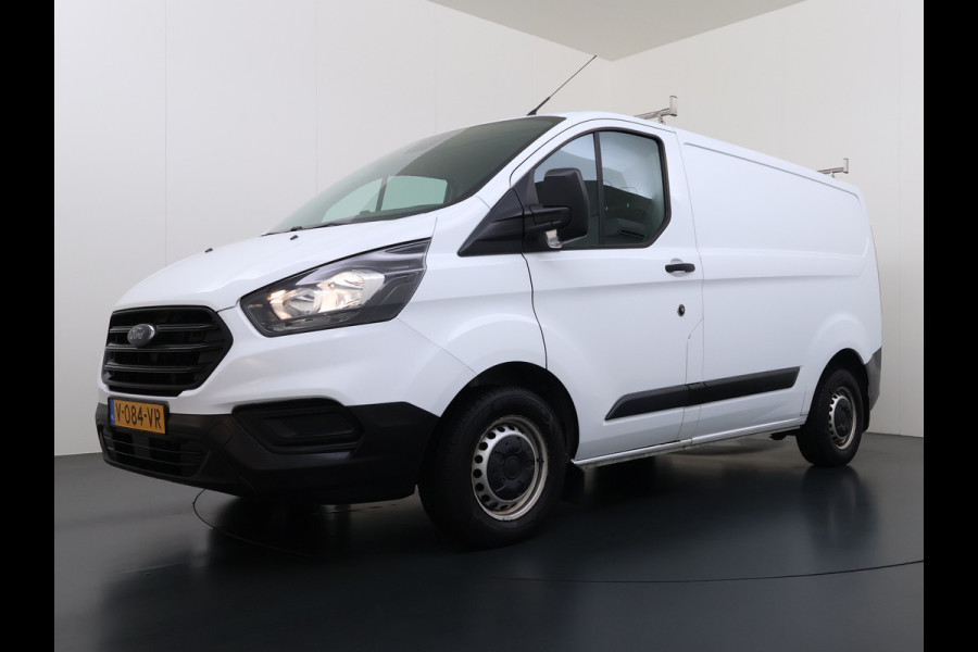 Ford Transit Custom 280 2.0TDCI L1H1 Euro 6 Trekhaak 3-Persoons Airco Voorruitverwarming Bluetooth Schuifdeur+Achterdeuren Inbouwkasten Vloer+Wandbetimmering Dakdragers 2.350KG Trekgewicht