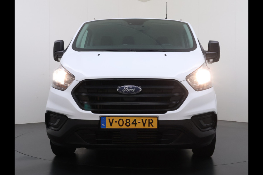 Ford Transit Custom 280 2.0TDCI L1H1 Euro 6 Trekhaak 3-Persoons Airco Voorruitverwarming Bluetooth Schuifdeur+Achterdeuren Inbouwkasten Vloer+Wandbetimmering Dakdragers 2.350KG Trekgewicht