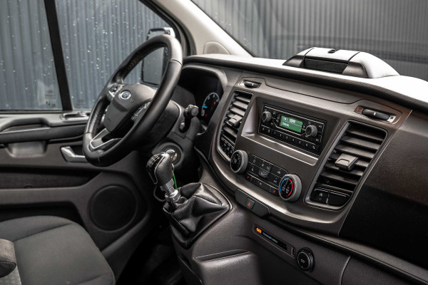 Ford Transit Custom 2.0 EcoBlue L2H1 | DC 5-Zits | 1e Eigenaar | Cruise | PDC | Stoelverw. | Airco | Trekhaak