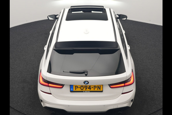 BMW 3 Serie Touring 320i M Sport Perfomance Parts 184pk | Panodak | Adaptive Cruise | Laser LED | Sportuitlaat Kleppen Besturing | Lederen Sportstoelen Verwarmd | Sfeerverlichting | Apple Carplay | 20"L.M | Navigatie | DAB |