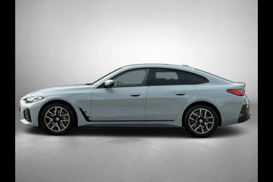BMW i4 EDrive40 84 kWh M-sport 94% SOH (NL-auto,1e eig, Dealer OndH, Carplay, SfeerV, Trekhaak,Camera, Lane A, Active Cruise, Etc)