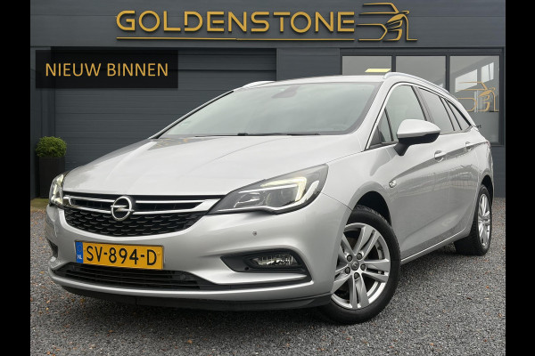 Opel Astra Sports Tourer 1.4 Online Edition ✓2e Eigenaar✓Trekhaak✓Carplay✓Navi✓Recent beurt gehad✓150pk✓Keyless✓6 Bak✓Rijstrooksensor✓Dodehoeksensor✓Pdc V+A✓Lm velgen✓Clima✓Cruise✓N.A.P✓Apk tot 06-2027
