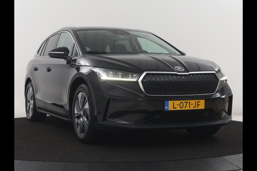 Škoda Enyaq iV 80 | SOH 90,4% | Adaptive cruise | Leder | Trekhaak | Stuur/stoelverwarming | Camera | Park assist | Carplay | Sfeerverlichting