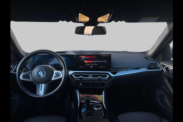 BMW i4 EDrive40 High Executive 84 kWh 96%SoH (NL-auto, 1e Eig, Dealer OndH, Trekhaak, Navi, Camera, Addpt Cruise, StoelV, Etc)
