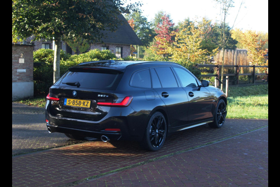 BMW 3 Serie Touring 320e | Facelift | 19 Inch | Camera | Sfeerverlichting | Cruise Control | Leer | NL-Auto |