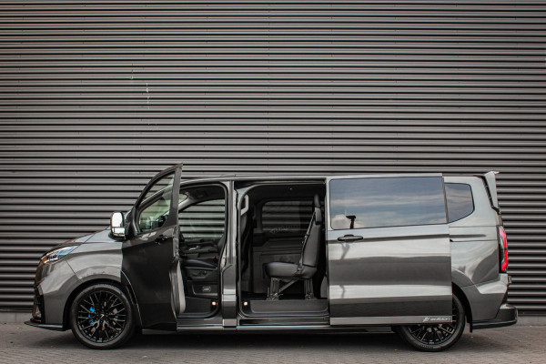 Ford E-Transit Custom 320 L2H1 MS-RT 71kWh 286PK DC DUBBEL CABINE / KUIPSTOELEN / DIRECT RIJDEN / NAVIGATIE / BLACK OPS/JB-EDITION