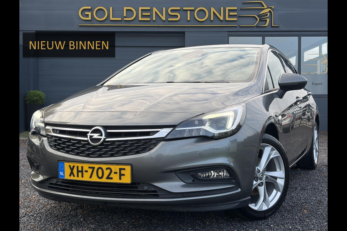 Opel Astra 1.4 Innovation ✓2e Eigenaar✓Carplay✓Keyless✓Camera✓Halfleder✓Navi✓Clima✓Cruise✓150pk✓Pdc V+A✓Rijstrooksensor✓6 Bak✓Dodehoeksensor✓17''Lm velgen✓Recent Beurt gehad✓N.A.P✓Nieuwe Apk bij Aflevering