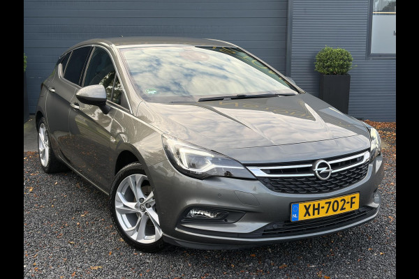 Opel Astra 1.4 Innovation ✓2e Eigenaar✓Carplay✓Keyless✓Camera✓Halfleder✓Navi✓Clima✓Cruise✓150pk✓Pdc V+A✓Rijstrooksensor✓6 Bak✓Dodehoeksensor✓17''Lm velgen✓Recent Beurt gehad✓N.A.P✓Nieuwe Apk bij Aflevering