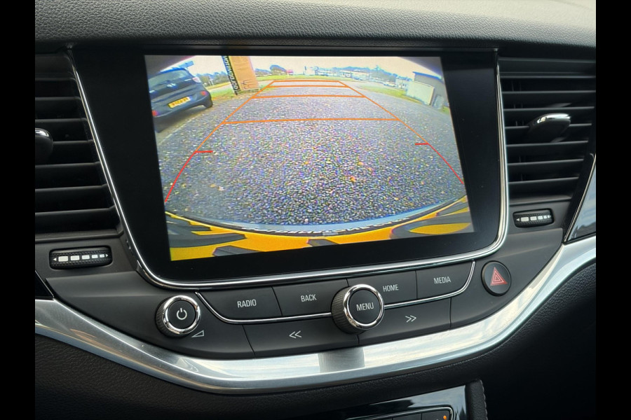Opel Astra 1.4 Innovation ✓2e Eigenaar✓Carplay✓Keyless✓Camera✓Halfleder✓Navi✓Clima✓Cruise✓150pk✓Pdc V+A✓Rijstrooksensor✓6 Bak✓Dodehoeksensor✓17''Lm velgen✓Recent Beurt gehad✓N.A.P✓Nieuwe Apk bij Aflevering