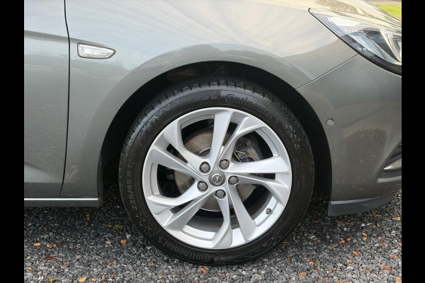 Opel Astra 1.4 Innovation ✓2e Eigenaar✓Carplay✓Keyless✓Camera✓Halfleder✓Navi✓Clima✓Cruise✓150pk✓Pdc V+A✓Rijstrooksensor✓6 Bak✓Dodehoeksensor✓17''Lm velgen✓Recent Beurt gehad✓N.A.P✓Nieuwe Apk bij Aflevering