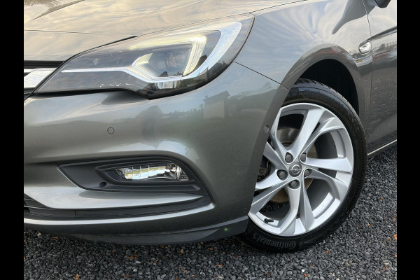 Opel Astra 1.4 Innovation ✓2e Eigenaar✓Carplay✓Keyless✓Camera✓Halfleder✓Navi✓Clima✓Cruise✓150pk✓Pdc V+A✓Rijstrooksensor✓6 Bak✓Dodehoeksensor✓17''Lm velgen✓Recent Beurt gehad✓N.A.P✓Nieuwe Apk bij Aflevering