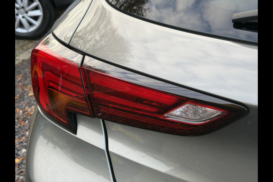 Opel Astra 1.4 Innovation ✓2e Eigenaar✓Carplay✓Keyless✓Camera✓Halfleder✓Navi✓Clima✓Cruise✓150pk✓Pdc V+A✓Rijstrooksensor✓6 Bak✓Dodehoeksensor✓17''Lm velgen✓Recent Beurt gehad✓N.A.P✓Nieuwe Apk bij Aflevering
