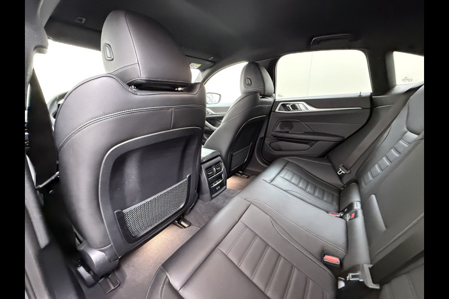 BMW i4 eDrive40 340PK 84kWh High Executive SOH 94% Leder Sportstoelen+Verwarmd Head-Up Display Camera Navi 3-Zone Ecc Live cockpit pro Laserlicht Elek.Achterklep Privacy Glas Isofix Wifi Bluetooth DAB Regen/Lichtsensor Draadloze lader 1e Eigenaar Dealeronderhouden Origineel Nederlandse Auto