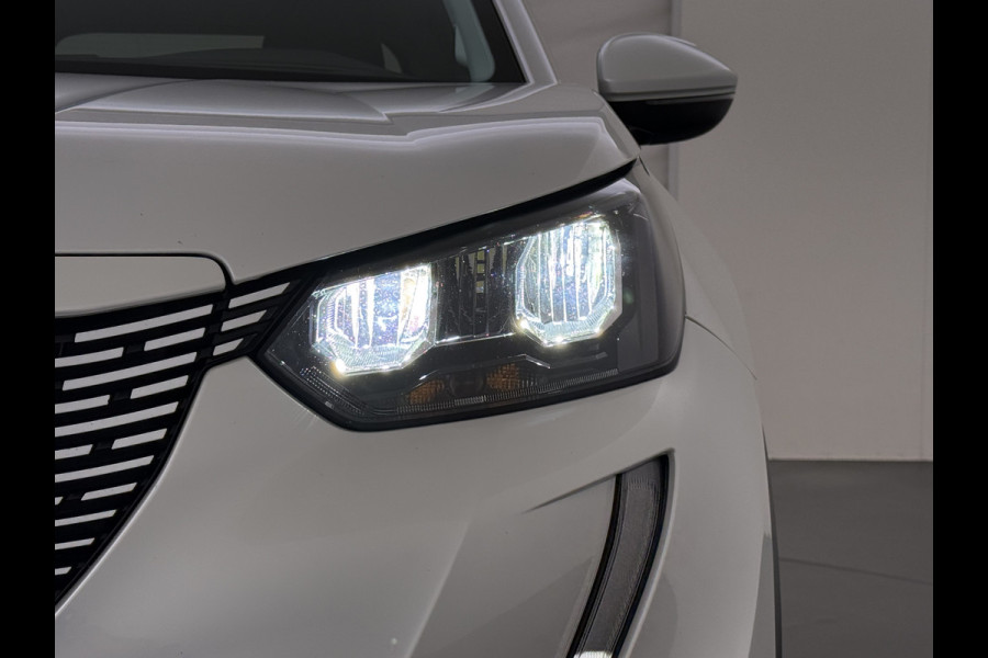 Peugeot e-2008 EV Allure Pack 50kWh Trekhaak 3D-Navi 360°Camera Apple Carplay Android Auto Ecc SOH 88% Regen-Lichtsensor Privacy Glas Led Isofix Bluetooth Cruise Control 1e Eigenaar Dealeronderhouden Origineel Nederlandse Auto