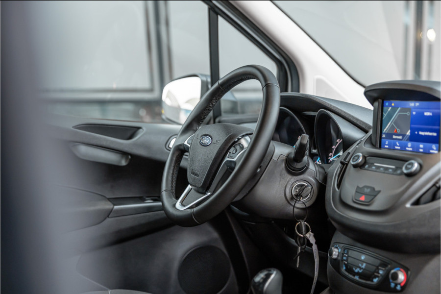 Ford Transit Courier 1.0 100 PK | Benzine | Navigatie | CarPlay | PDC | Stoelverwarming | Cruise control | MF Stuur | Airco | Nieuwe APK | Dealer onderhouden