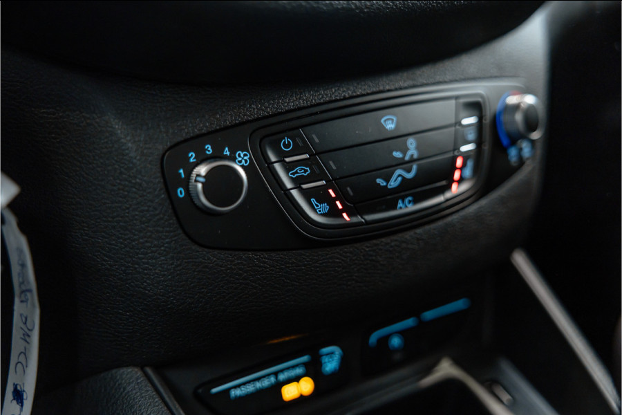 Ford Transit Courier 1.0 100 PK | Benzine | Navigatie | CarPlay | PDC | Stoelverwarming | Cruise control | MF Stuur | Airco | Nieuwe APK | Dealer onderhouden