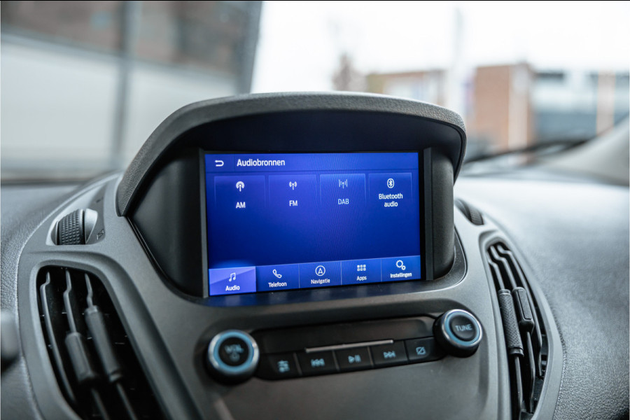 Ford Transit Courier 1.0 100 PK | Benzine | Navigatie | CarPlay | PDC | Stoelverwarming | Cruise control | MF Stuur | Airco | Nieuwe APK | Dealer onderhouden