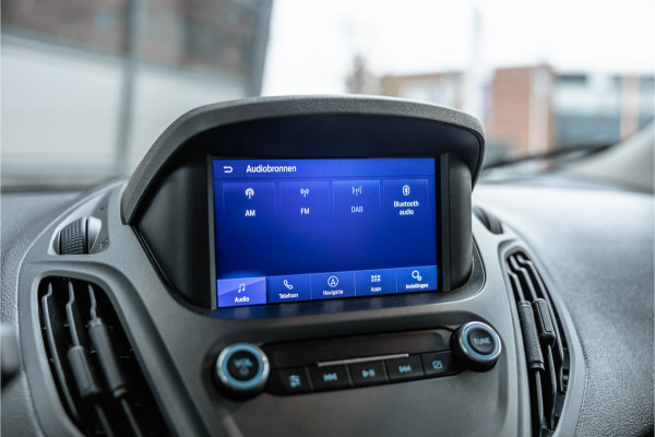 Ford Transit Courier 1.0 100 PK | Benzine | Navigatie | CarPlay | PDC | Stoelverwarming | Cruise control | MF Stuur | Airco | Nieuwe APK | Dealer onderhouden